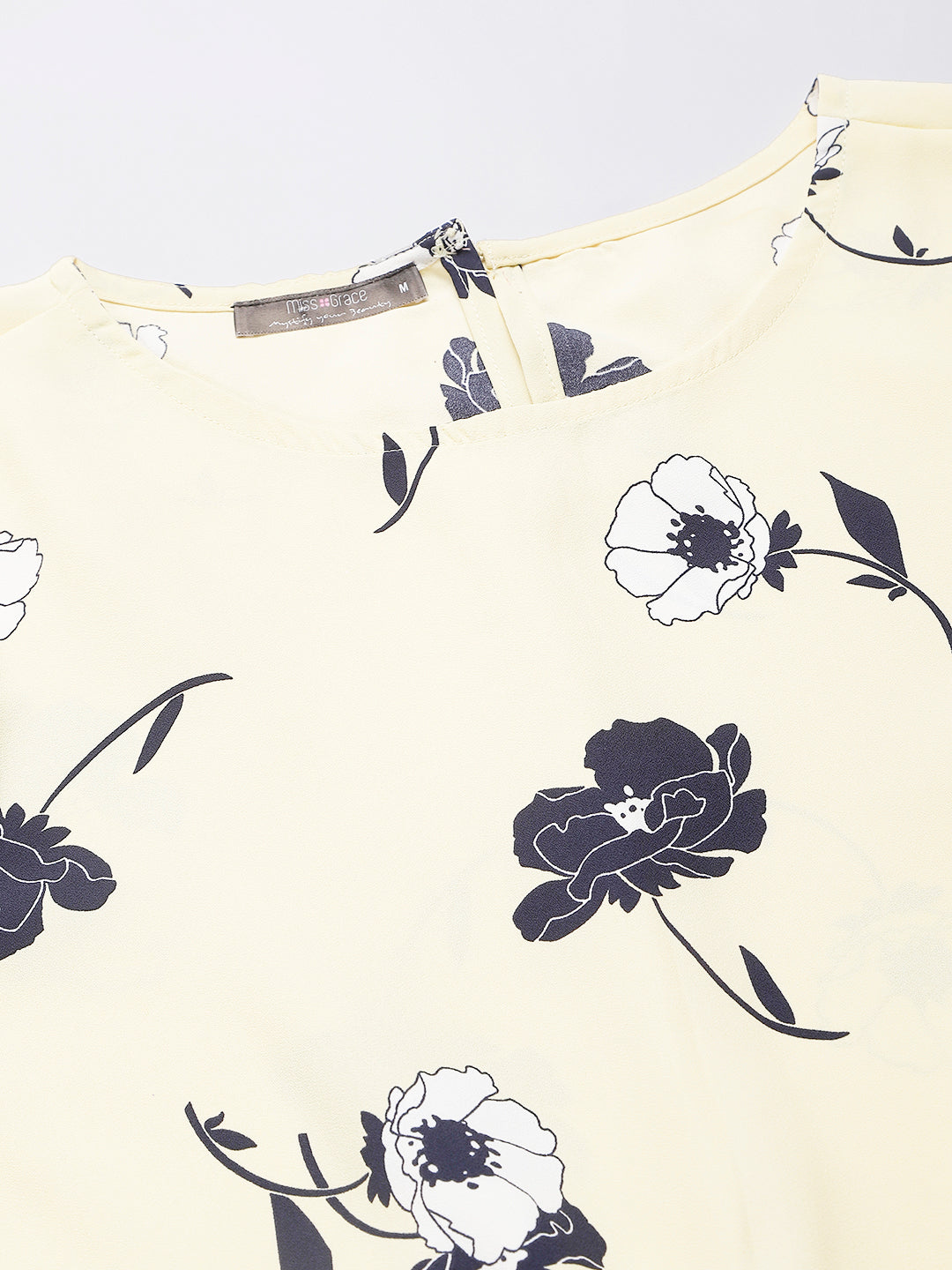 Lemon Floral Top With Elasticated Waist Band At Back For Perfect Fit